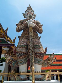Statues of mythological giant in front of Galleries in Temple of The Emerald Buddha (Wat Phra Kaew), Bangkok, Thailand