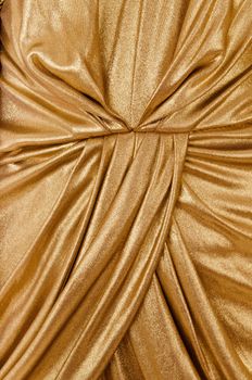 folds gold fabric closeup
