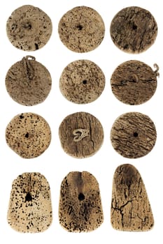 Old fishing net cork on white background