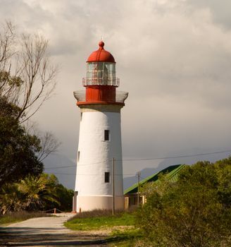 The Robben Island Lighthouse is 18 meters (59') high and visible for 24 nm.