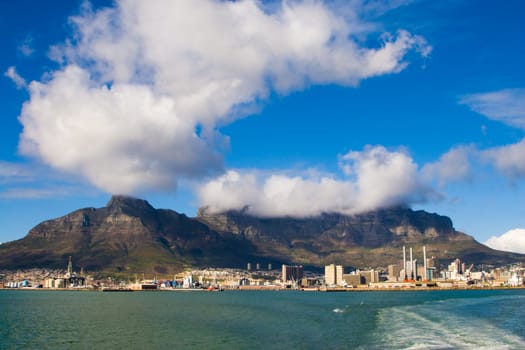 Table Mountain looms over Cape Town in this view from a speeding boat.