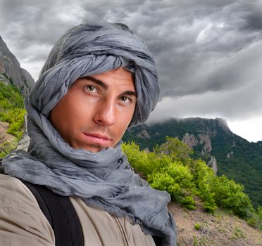 young man - tourist with backpack on a white background