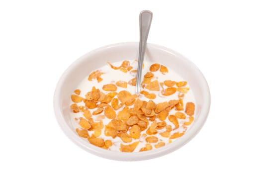 Bowl with corn flakes and milk, photo on white 