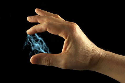 Lightning between two fingers. Black Background.