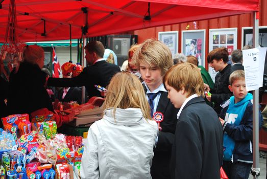 Kids at a sweets sales stand during norwegian national day in Tromsø (2011).