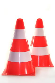 two pylons in front of white background
