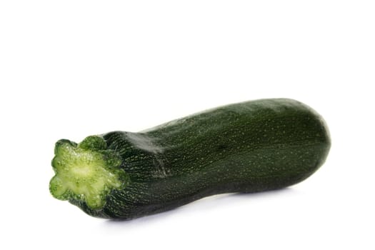 a zucchini on a white background
