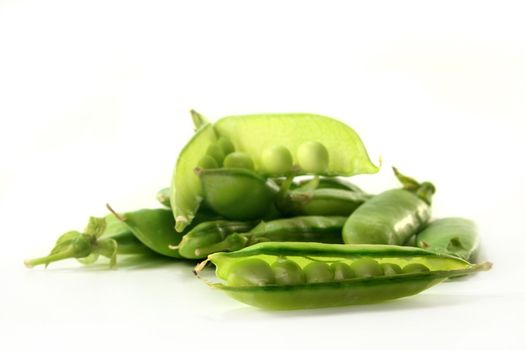 Snow peas on a white background