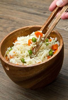 Chinese fried rice with carrots, peas and soybeans