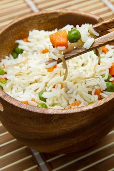 Chinese fried rice with carrots, peas and soybeans