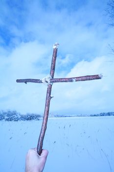 Cross in winterscene