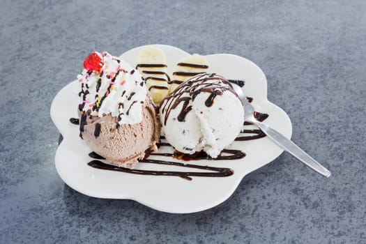 Ice cream cookie and cream banana on plate