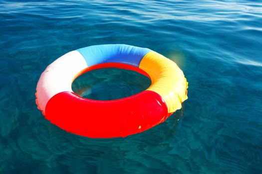 swim ring floating on beautiful blue water