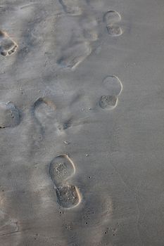 Human trace of a foot on sand