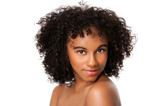 Beautiful happy female face with smooth skin and dark curly hair, isolated.