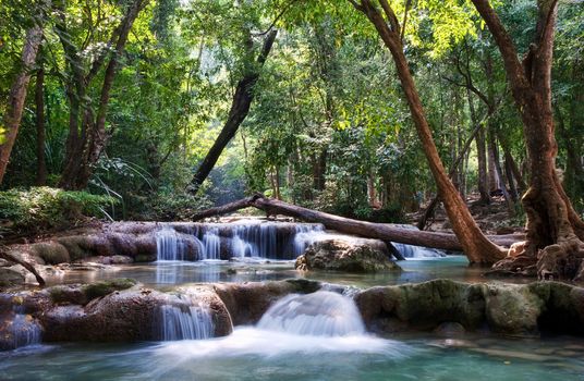 beautiful waterfall cascades in erawan kanachanburi thailand