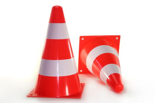 two pylons in front of white background