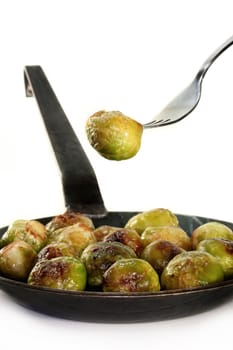 roasted brussels sprouts on white background