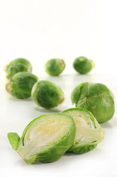 fresh, raw Brussels sprouts on white background