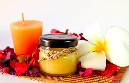 Spa products with flowers and candles