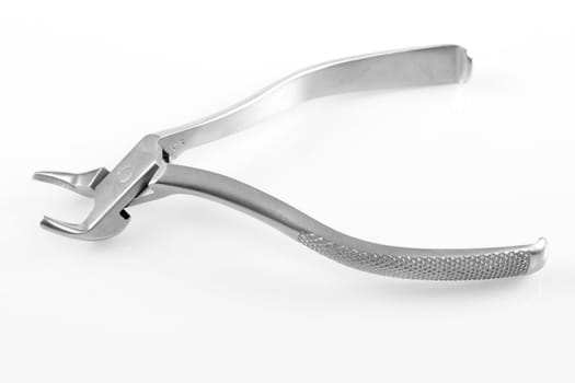 Dental pliers photo on the white backgroud