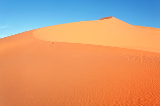 Moroccan desert dune background and Blue sky 