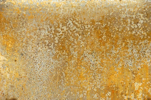 Grungy abstract background of metal. From a burnt out car.
