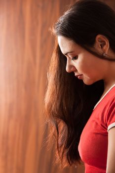 High contrast, head and hair portrait of a young Indian woman