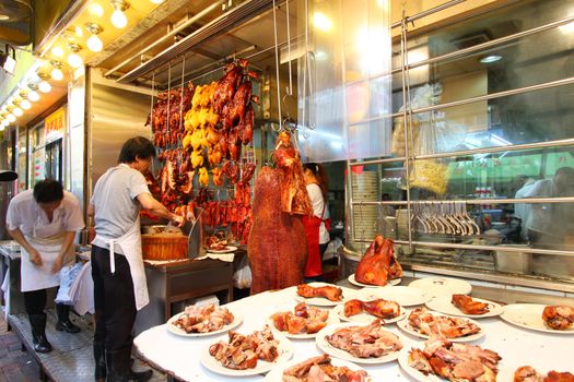 HONG KONG - SEPT 10, A very traditional roasted meat rice shop in Hong Kong on 10 September, 2011. The roasted meat is an icon in Hong Kong.