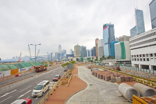 Hong Kong traffic and downtown at day