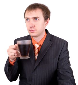 The young businessman drinks coffee