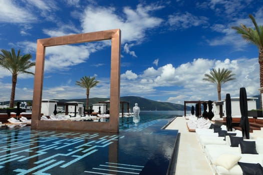 copper square and white torso artwork in Montenegro