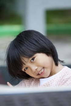 Asian young girl smiling