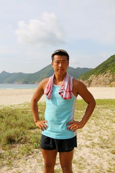 Young sports man outdoor, ready for hiking.