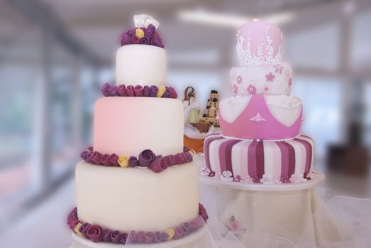 display of artistic wedding cakes