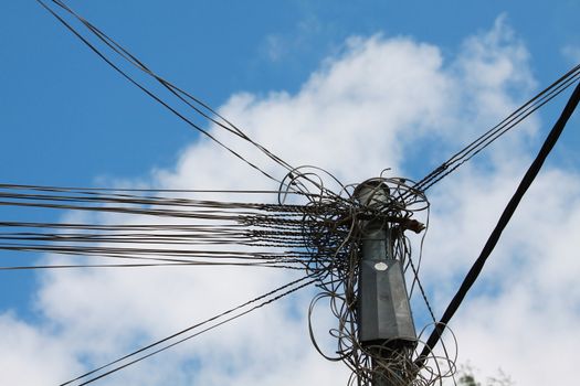 Electic wires under blue sky