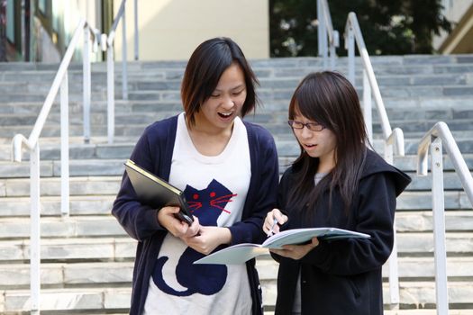 Asian students on campus in a university