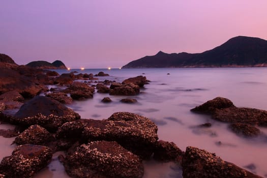 Sunset along the coast. Nature composition under long exposure.