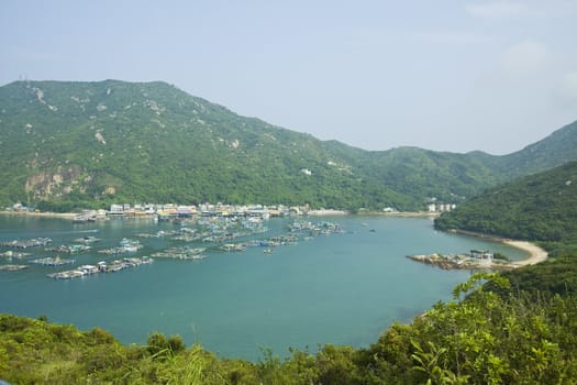 Fishing village from hill top at day