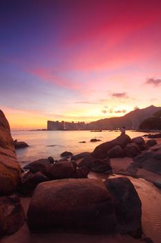 Sunset with sea stones under long exposure