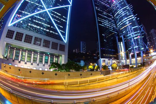 Busy traffic in city at night - Pearl of the East: Hong Kong.