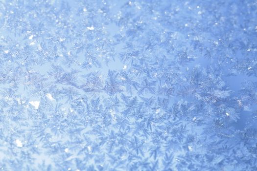 evening blue frost pattern texture on the glass