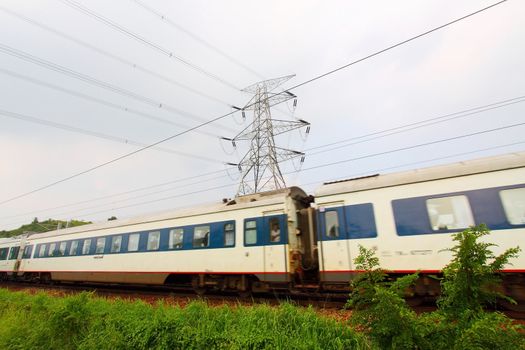 Moving train in Hong Kong at day