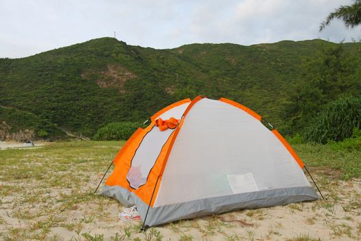 Wild camping on beach with tent