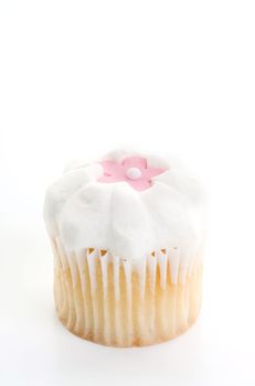 little iced cupcake isolated on white background