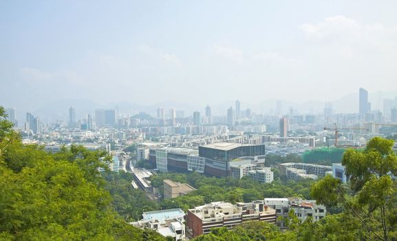 Kowloon area of Hong Kong downtown at day time 