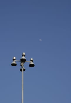Street lamp isolated on a blue sky