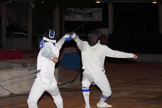 HONG KONG - 24 AUG, Lingnan University holds new student orientation every year to welcome freshmen on 24 August, 2011, Hong Kong. Lion Fencing society gives a fencing performance.