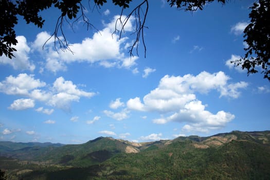 Mountain valley on blue sky