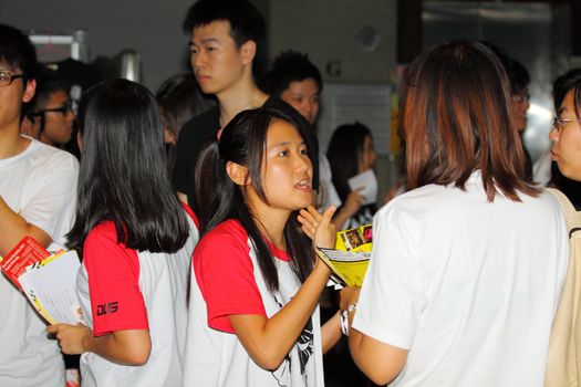 HONG KONG - 24 AUG, Lingnan University holds new student orientation every year to welcome freshmen on 24 August, 2011, Hong Kong. Different society provides game to attract freshmen to join. 
